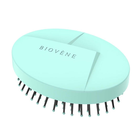The conscious™ Compact Detangling Brush Mint Green